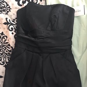 David’s Bridal strapless black dress with pockets.